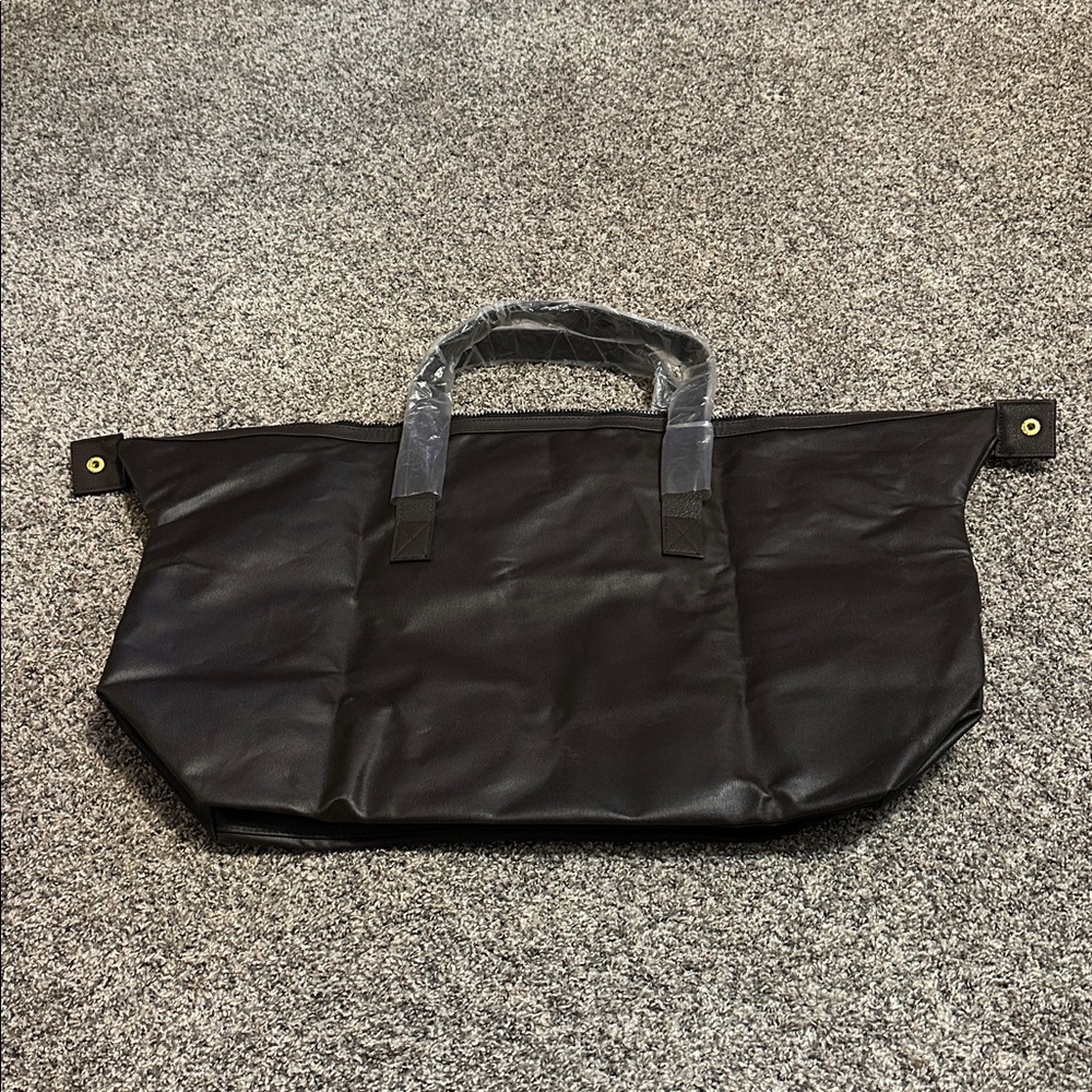 Paco Rabanne parfum nylon duffle weekender with top zipper. NWOT